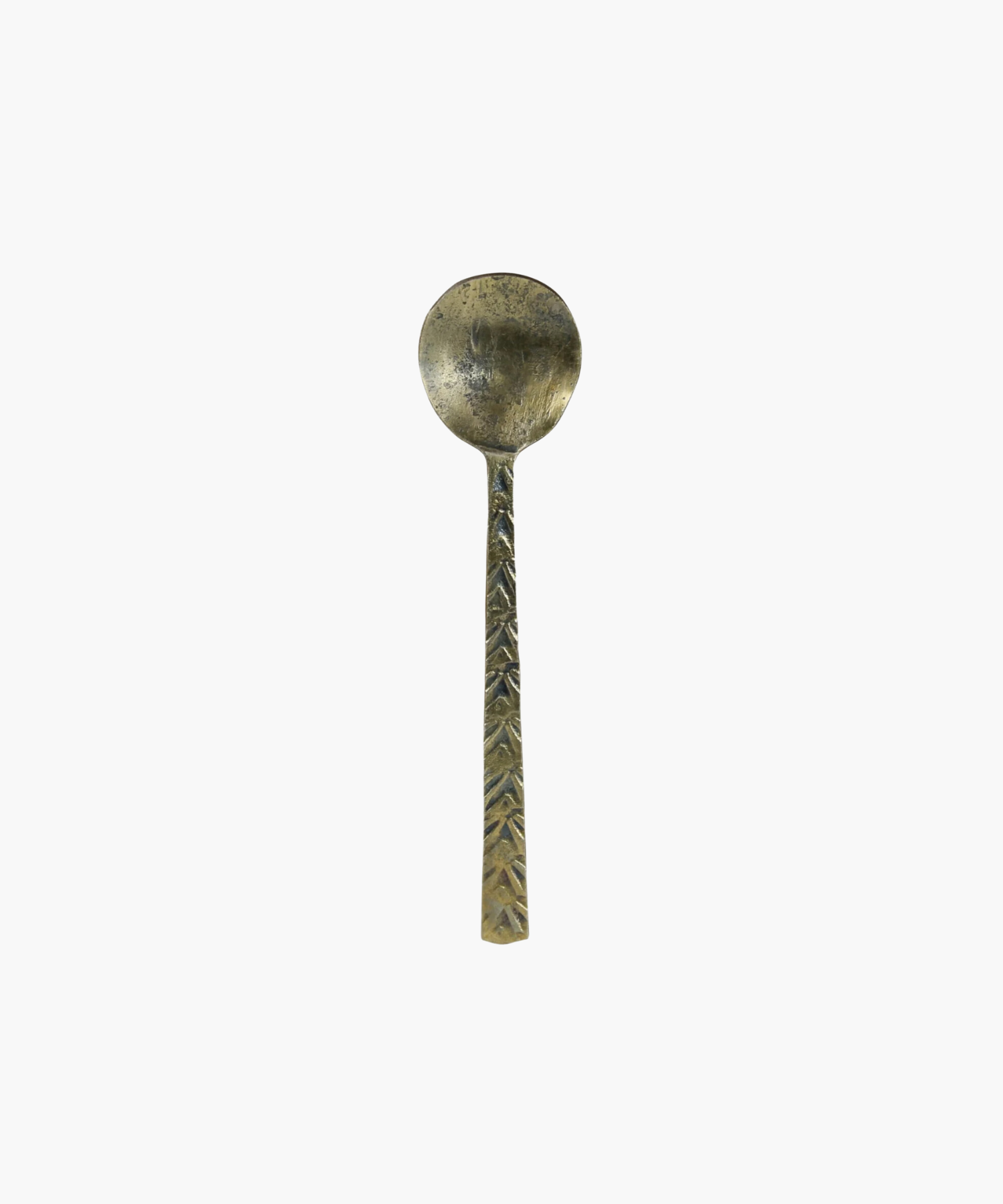 Antique inspired metal spoon with a textured handle featuring a leaf pattern. The spoon has a tarnished, rustic appearance, evoking a sense of history and nostalgia. | Wildwood Home Co.