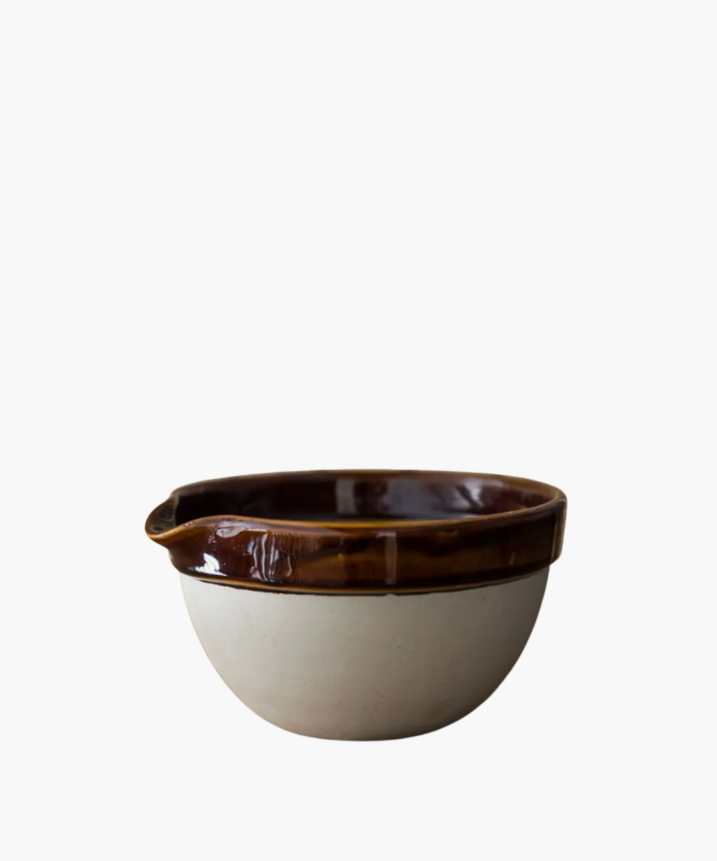 A ceramic bowl with a glossy brown rim and matte beige exterior. The design is rustic and visually pleasing. | Wildwood Home Co. 