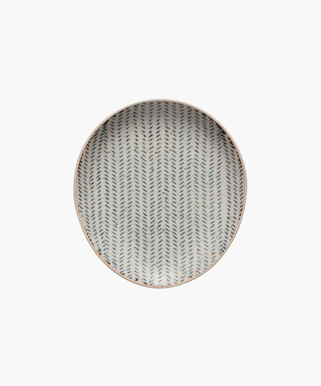Round ceramic spoon rest with a diagonal blue herringbone pattern on a white background. The design is symmetrical, creating an elegant, minimalist look. | Wildwood Home Co.

