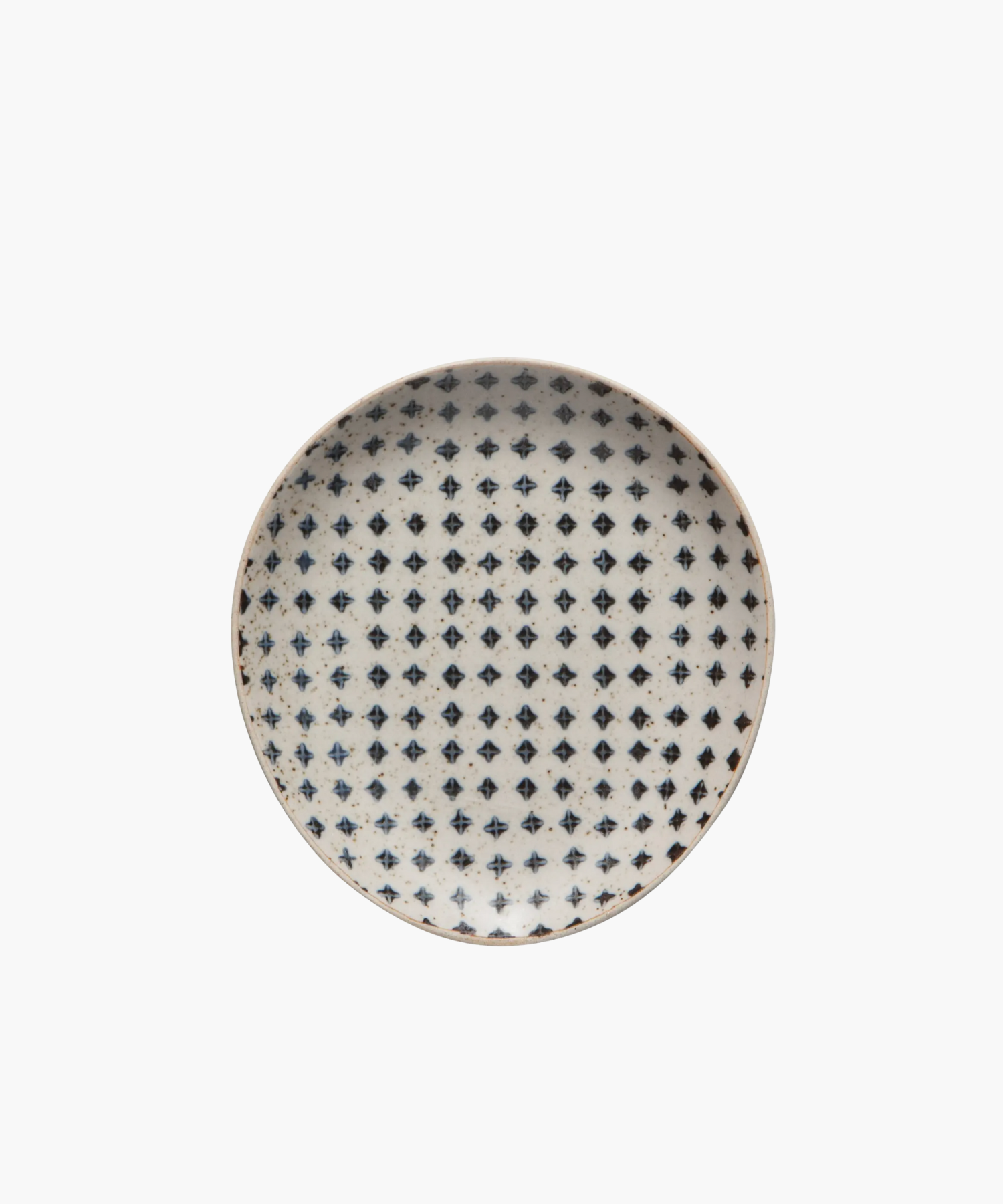 A round ceramic spoon rest with a white background features a repeating pattern of small, dark blue cross shapes, creating a rustic and elegant look. | Wildwood Home Co.