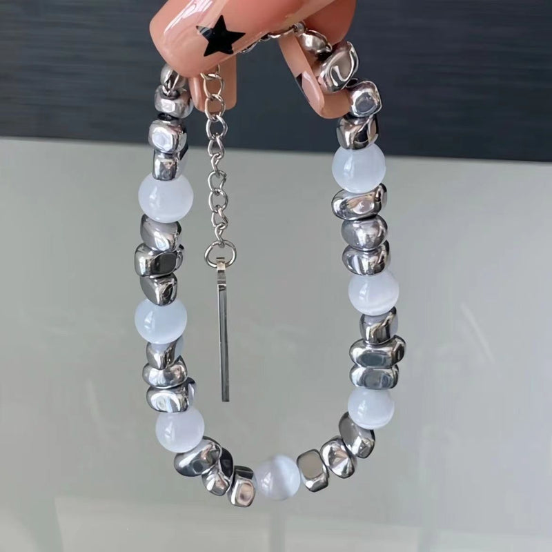 Cross and Cat-Eye Bracelet Collection