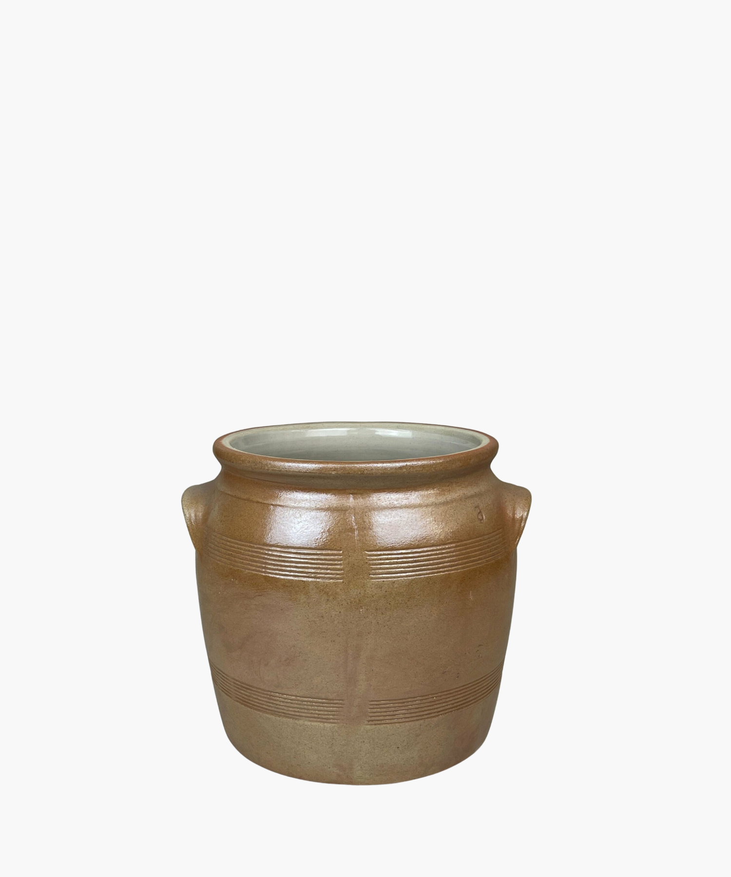 A rustic, brown salt crock with two small handles and horizontal etched lines. The pot has a smooth finish, conveying a simple, earthy elegance. | SW Home