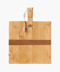 Square pine wood cutting or charcuterie board with a natural finish, featuring a dark horizontal stripe and a handle with a rope loop.  | SW Home