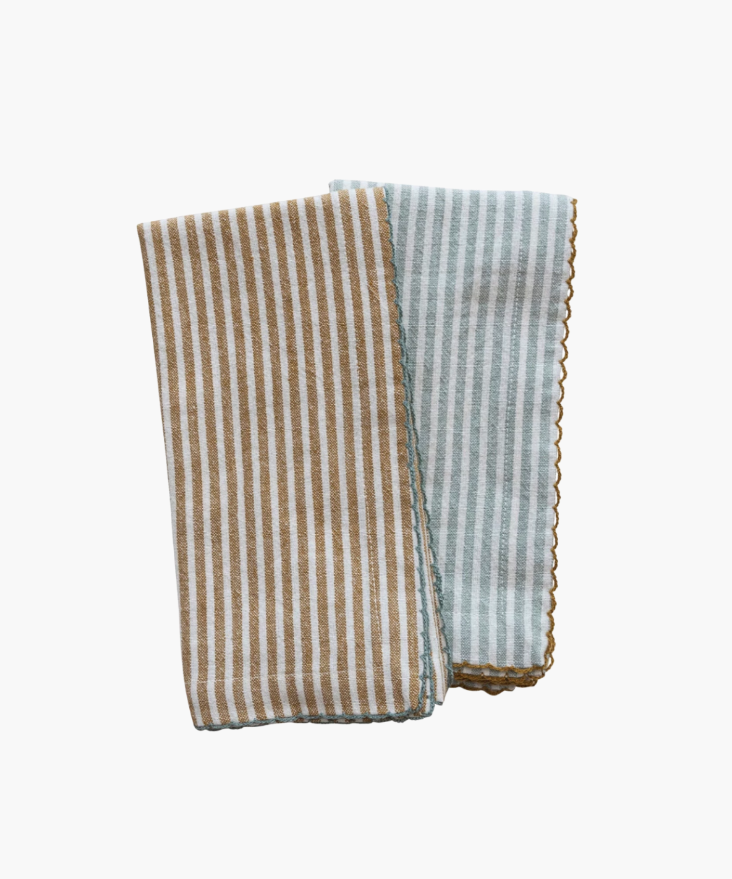 Two folded napkins with vertical stripes, one in beige and white, the other in light blue and white. The edges have scalloped stitching. | Wildwood Home Co.